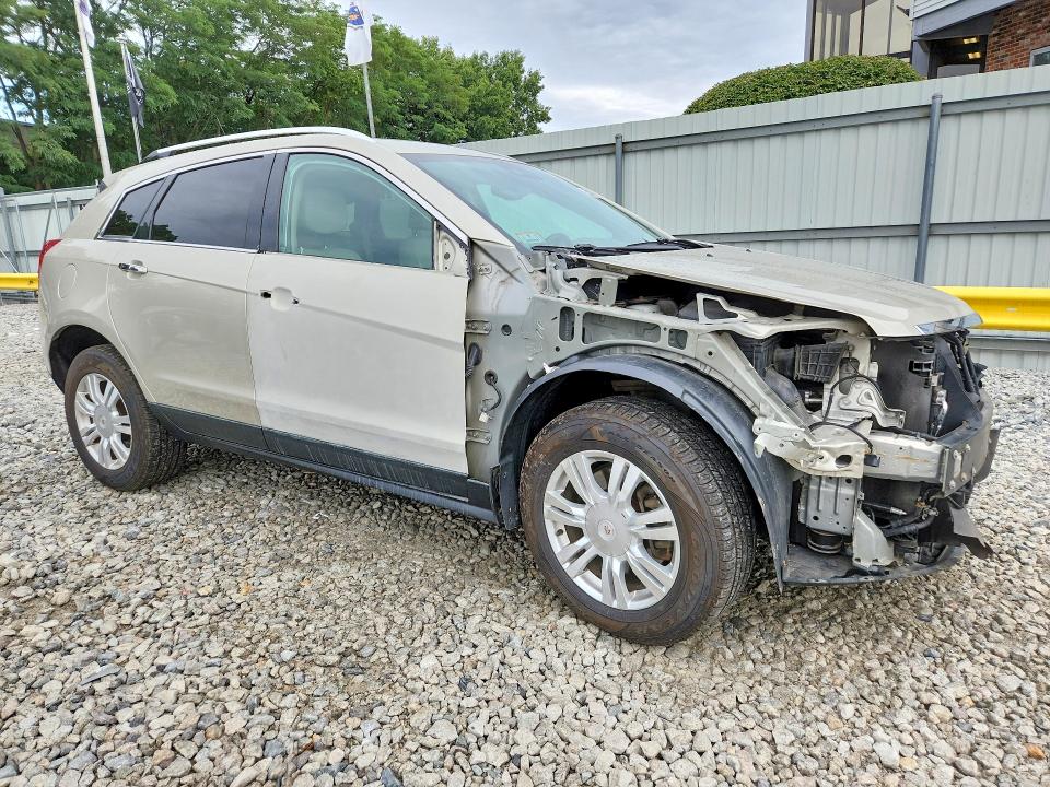 Photo 4 from auction – 2014 CADILLAC SRX with VIN 3GYFNBE39ES682400
