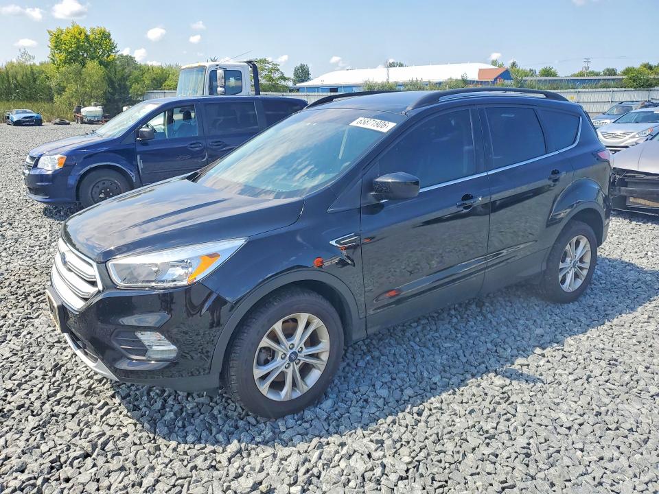 FORD ESCAPE 2018 with VIN 1FMCU9GD6JUD27569 - Photo from auction