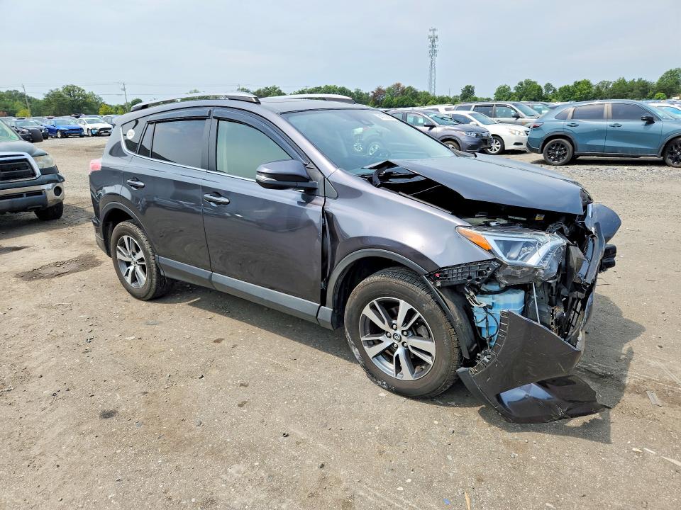 Photo 4 from auction – 2018 TOYOTA RAV4 with VIN JTMRFREV0JJ206607