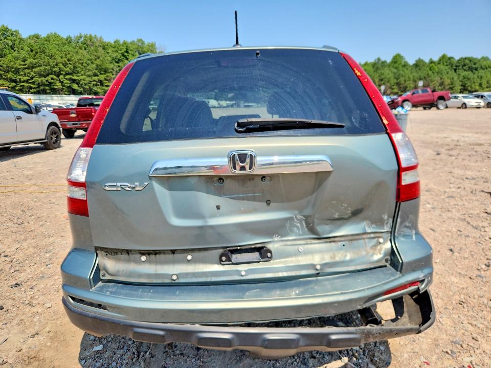 Photo 6 from auction – 2011 HONDA CR-V with VIN 5J6RE3H70BL027335