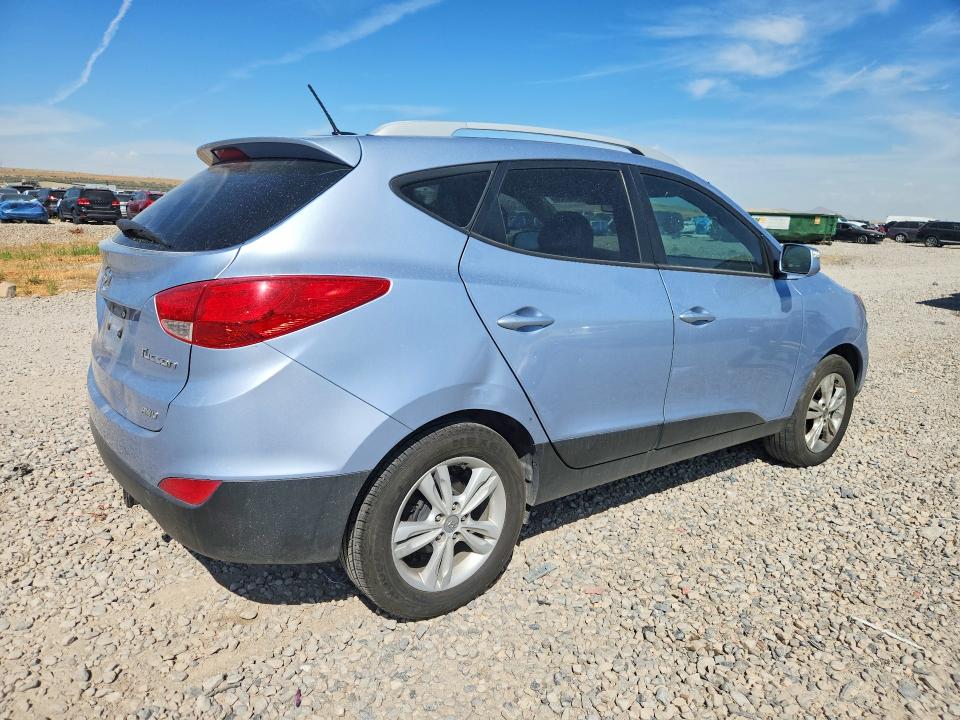 Photo 3 from auction – 2012 HYUNDAI TUCSON with VIN KM8JUCAC6CU379940