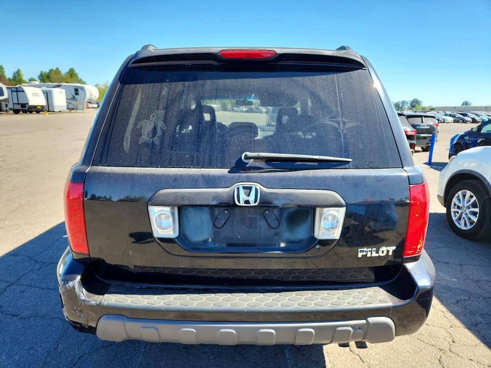 Photo 6 from auction – 2004 HONDA PILOT with VIN 2HKYF18544H574147