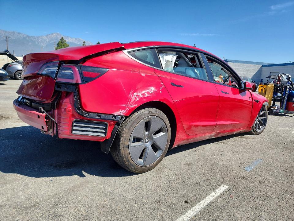 Photo 3 from auction – 2022 TESLA MODEL 3 with VIN 5YJ3E1EAXNF361010