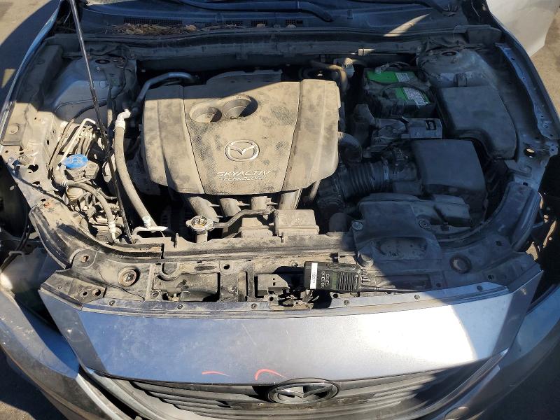 Photo 11 from auction – 2014 MAZDA 3 with VIN JM1BM1L78E1100490