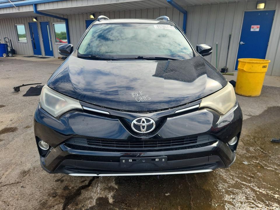 Photo 5 from auction – 2016 TOYOTA RAV4 with VIN 2T3RFREV0GW527671