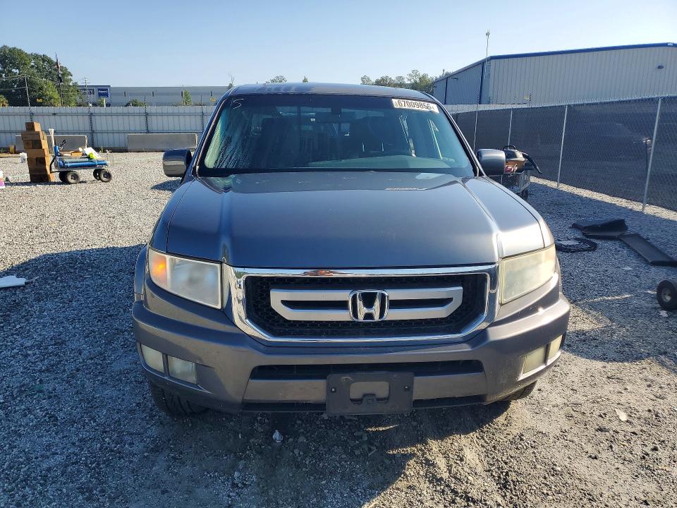 Photo 5 from auction – 2011 HONDA RIDGELINE with VIN 5FPYK1F52BB453067