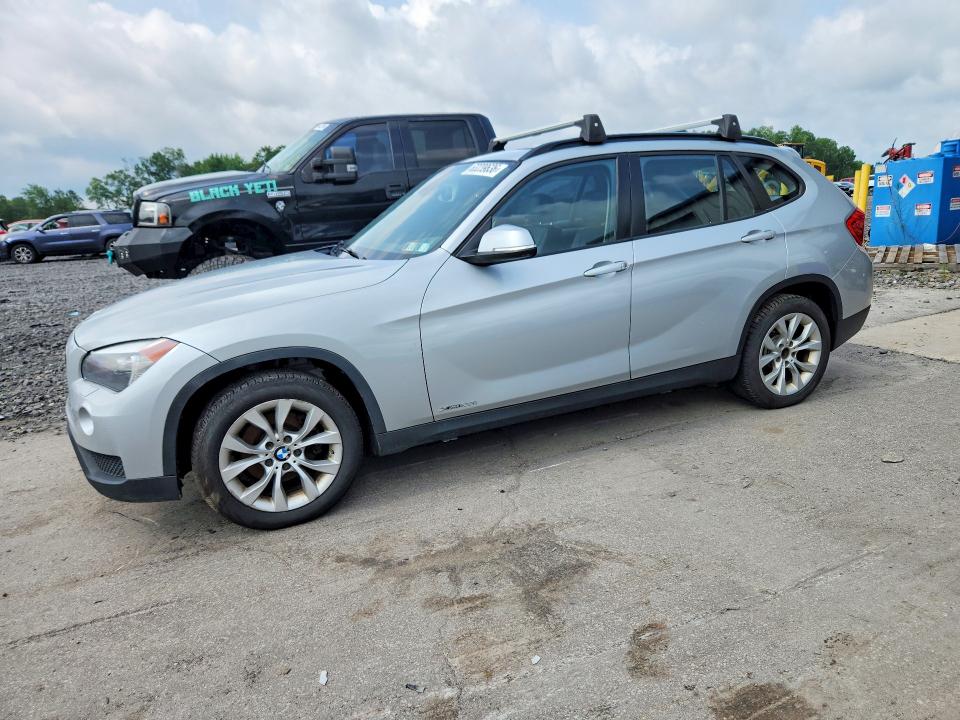 BMW X1 2013 with VIN WBAVL1C57DVR91892 - Photo from auction