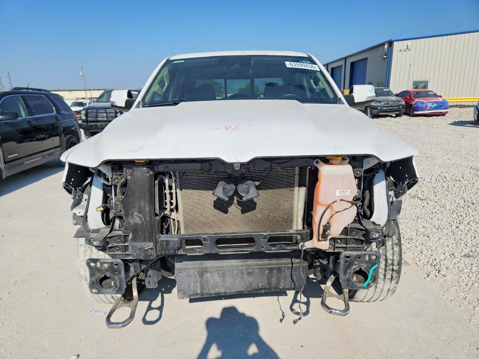 Photo 5 from auction – 2021 RAM 1500 with VIN 1C6SRFJT8MN730359