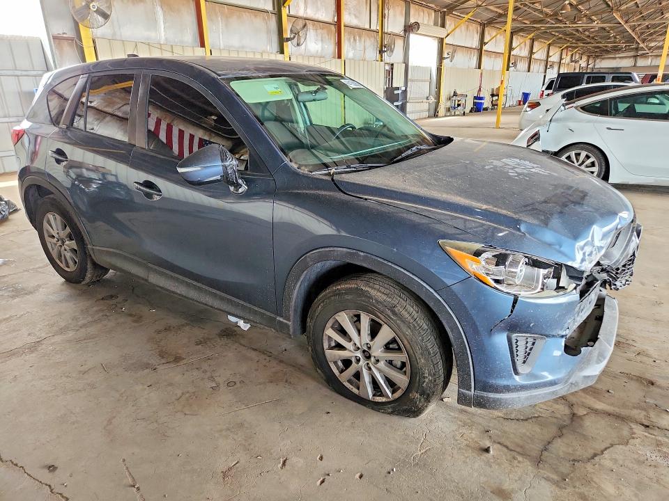 Photo 4 from auction – 2015 MAZDA CX-5 with VIN JM3KE2BE4F0482910