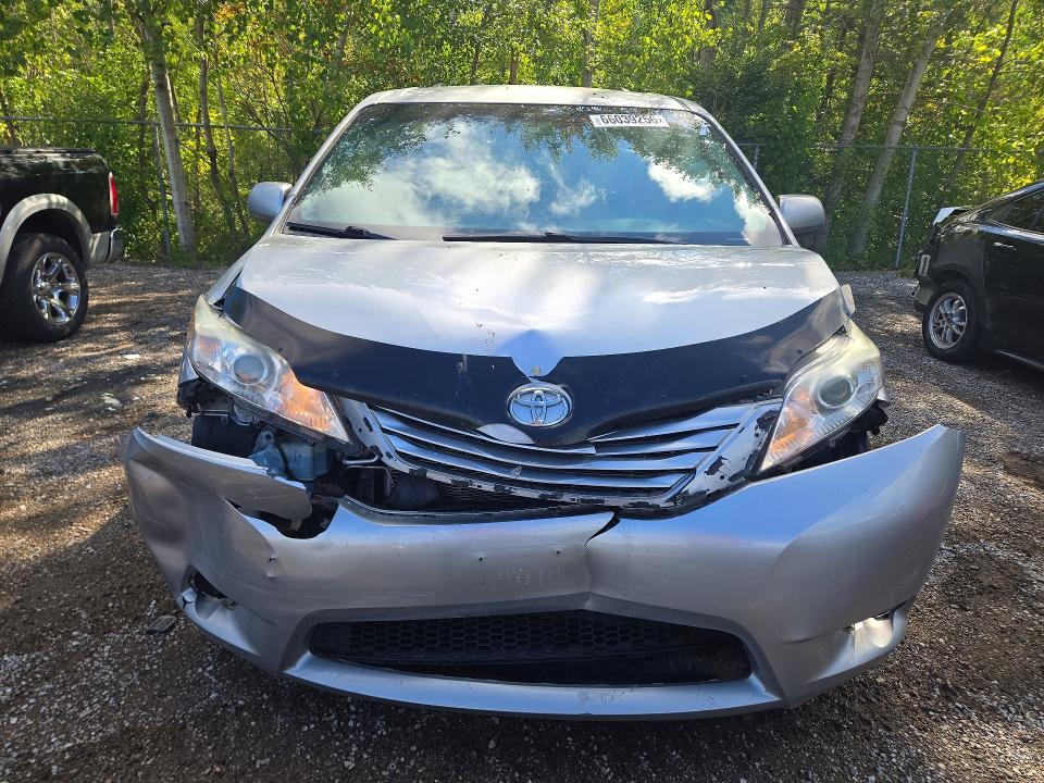 Photo 5 from auction – 2015 TOYOTA SIENNA with VIN 5TDKK3DCXFS668886