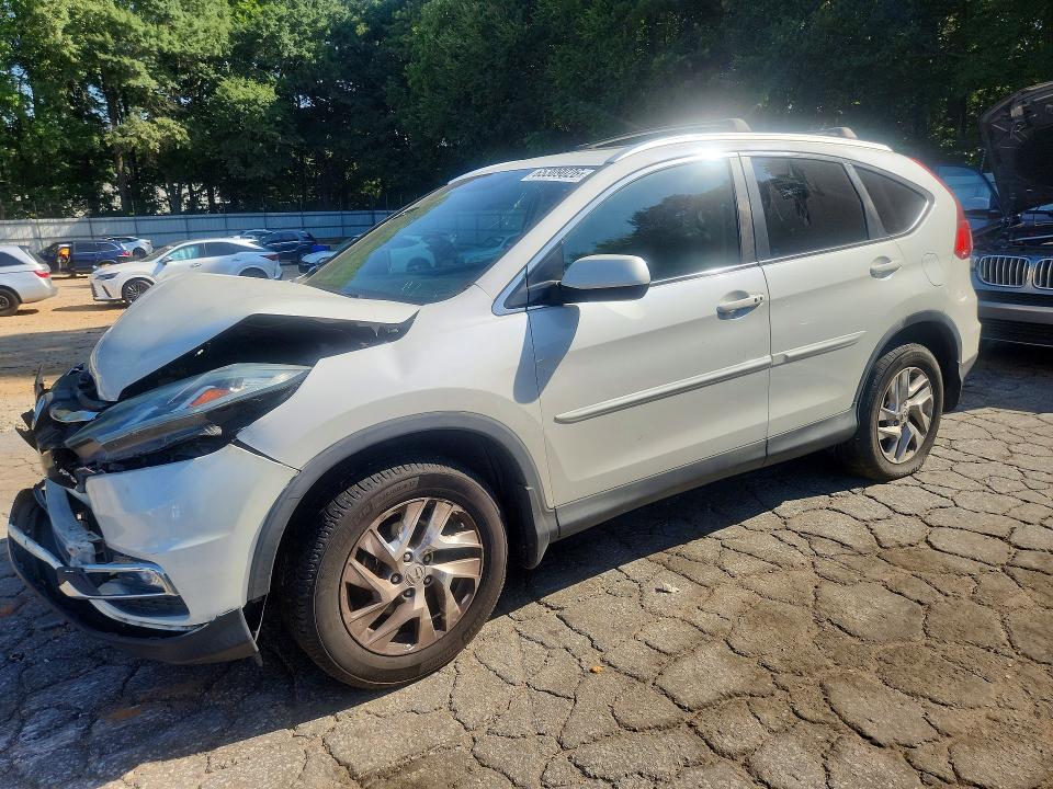 HONDA CR-V 2015 with VIN 5J6RM3H79FL010381 - Photo from auction