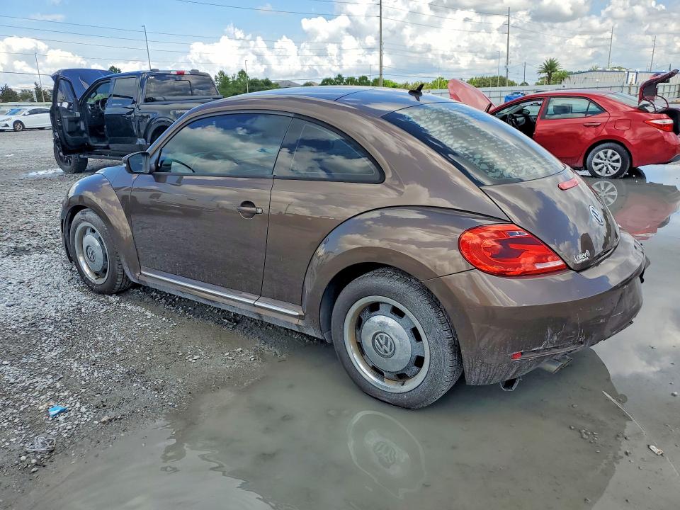 Photo 2 from auction – 2012 VOLKSWAGEN BEETLE with VIN 3VWJP7AT6CM651116
