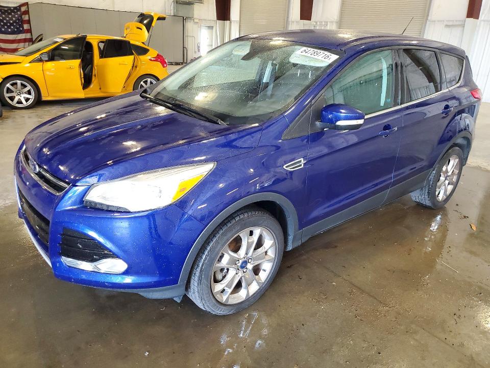 FORD ESCAPE 2013 with VIN 1FMCU9H90DUD38954 - Photo from auction