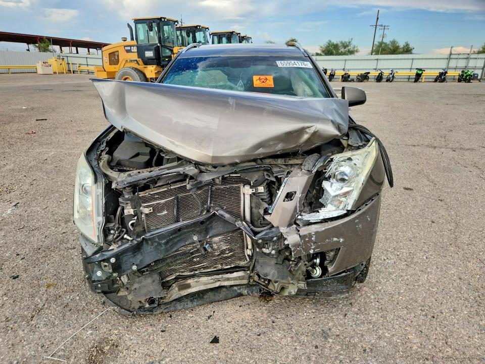 Photo 5 from auction – 2012 CADILLAC SRX with VIN 3GYFNBE36CS608140