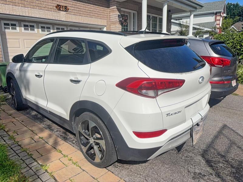 Photo 4 from auction – 2017 HYUNDAI TUCSON with VIN KM8J3CA21HU264373