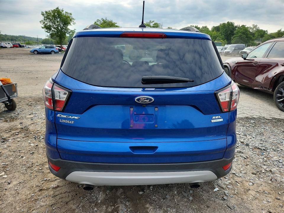 Photo 6 from auction – 2018 FORD ESCAPE with VIN 1FMCU0HDXJUA21663