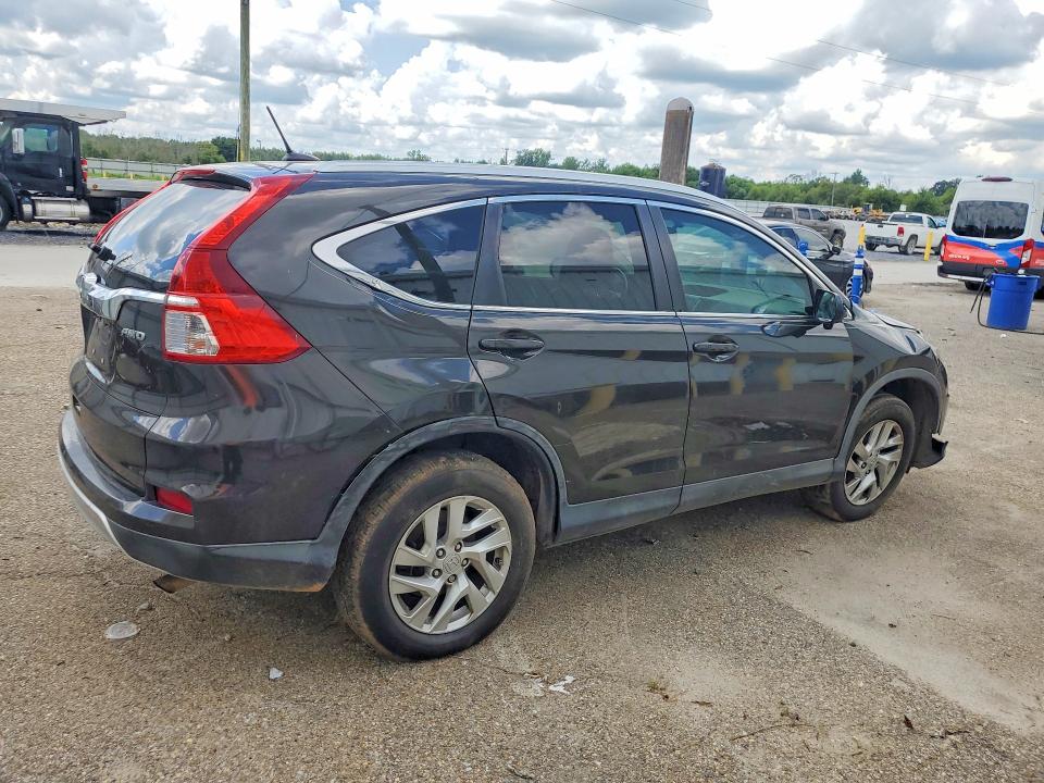 Photo 3 from auction – 2015 HONDA CR-V with VIN 5J6RM4H70FL091115
