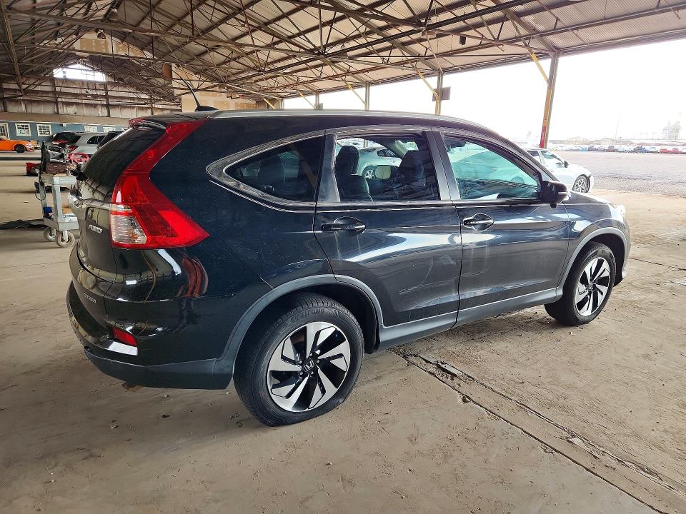 Photo 3 from auction – 2016 HONDA CR-V with VIN 5J6RM4H97GL000439