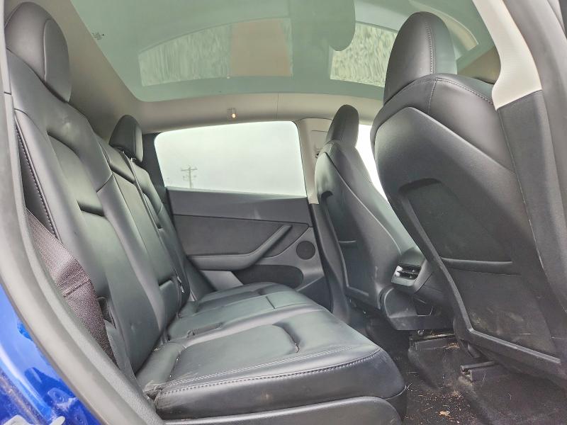 Photo 11 from auction – 2023 TESLA MODEL Y with VIN 7SAYGAEEXPF777194