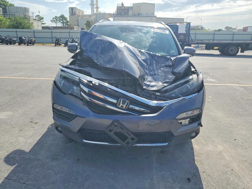 Photo 5 from auction – 2016 HONDA PILOT with VIN 5FNYF6H08GB117815