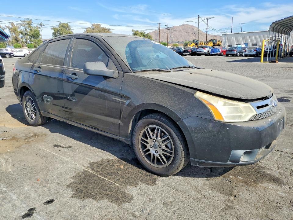 Photo 4 from auction – 2011 FORD FOCUS with VIN 1FAHP3FN9BW116726