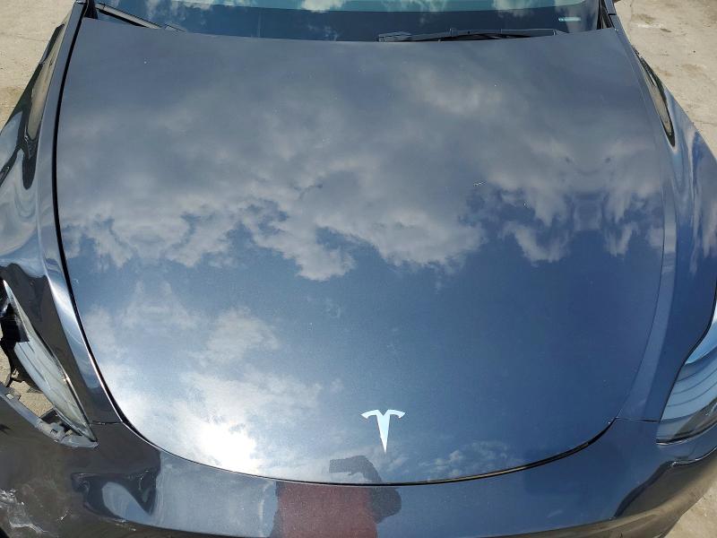Photo 12 from auction – 2024 TESLA MODEL Y with VIN 7SAYGDEE8RA244598