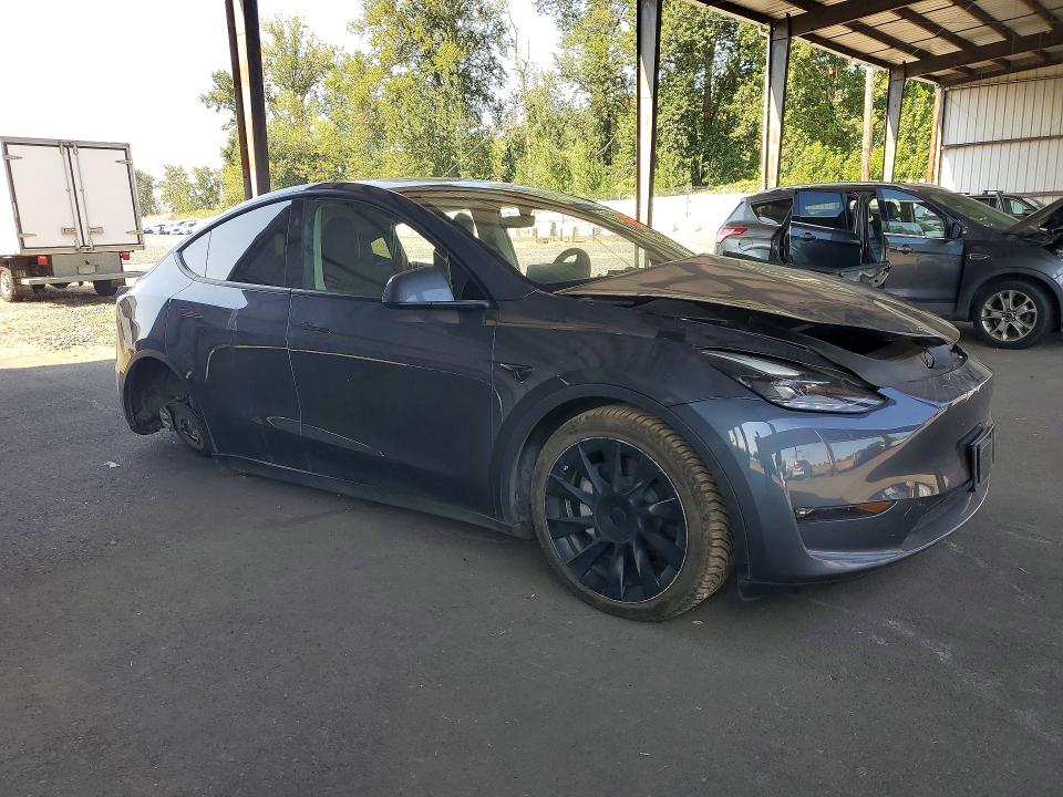 Снимка 4 от търг – 2023 TESLA MODEL Y с VIN 7SAYGDEE9PF828668