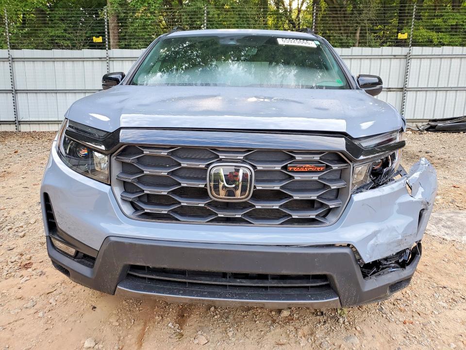 Photo 5 from auction – 2022 HONDA PASSPORT with VIN 5FNYF8H62NB024771