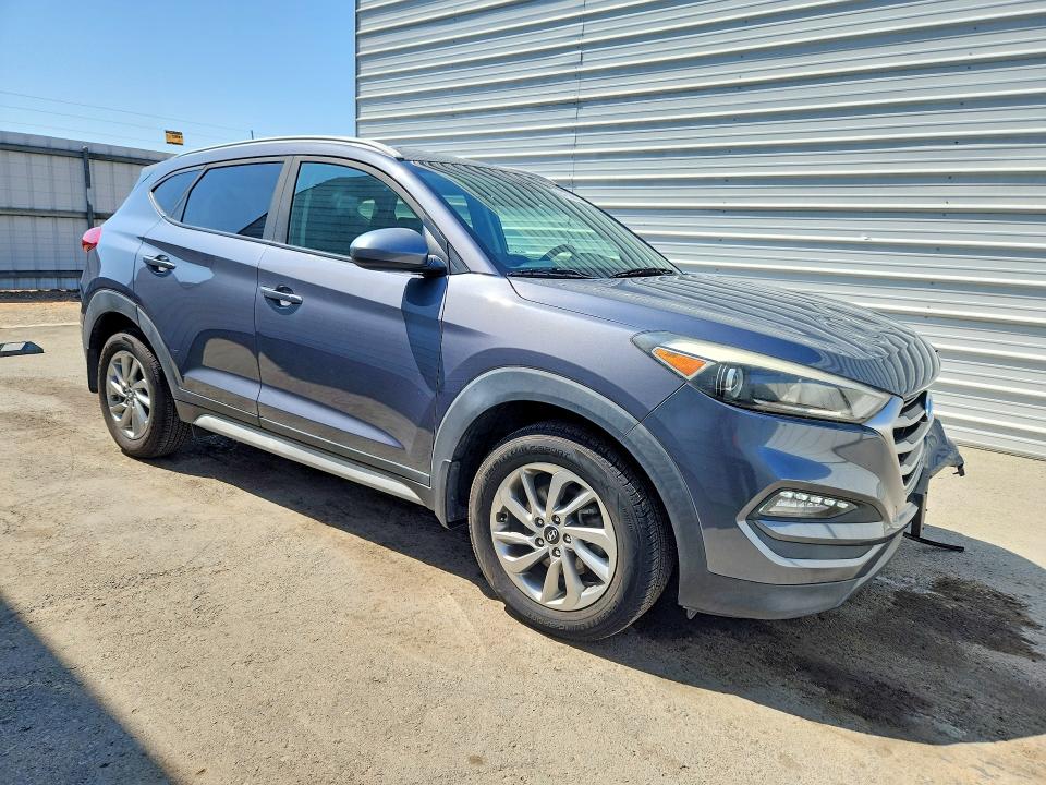 Photo 4 from auction – 2018 HYUNDAI TUCSON with VIN KM8J33A46JU810950