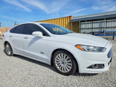 Photo 4 from auction – 2016 FORD FUSION SE with VIN 3FA6P0PU7GR320754