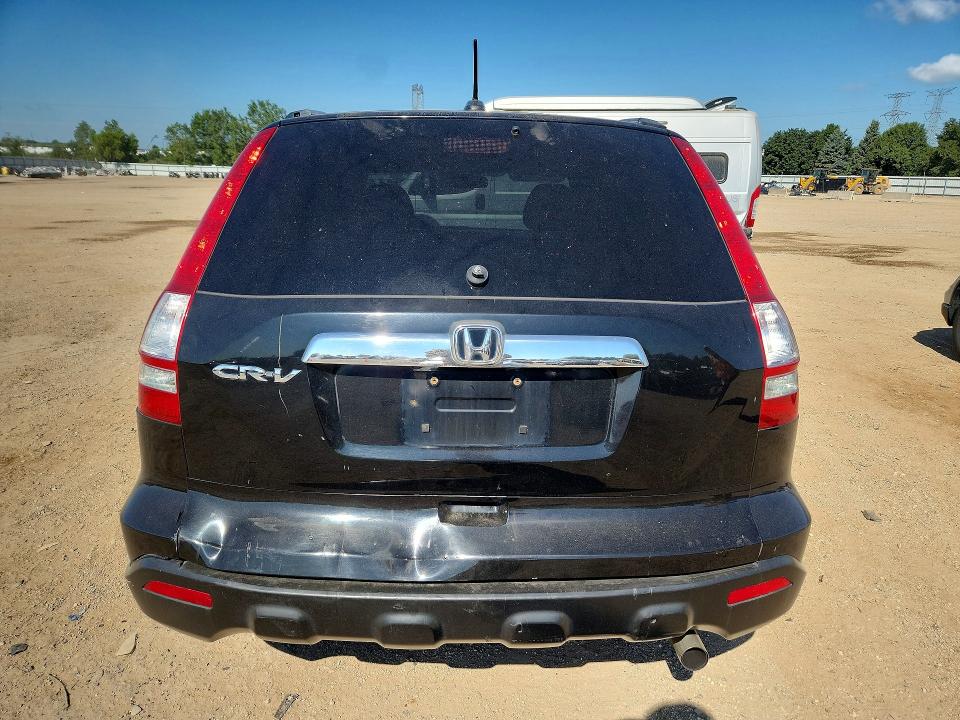 Photo 6 from auction – 2009 HONDA CR-V with VIN 5J6RE48709L006131