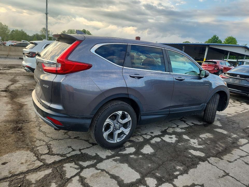 Photo 3 from auction – 2018 HONDA CR-V with VIN 7FARW2H84JE098968