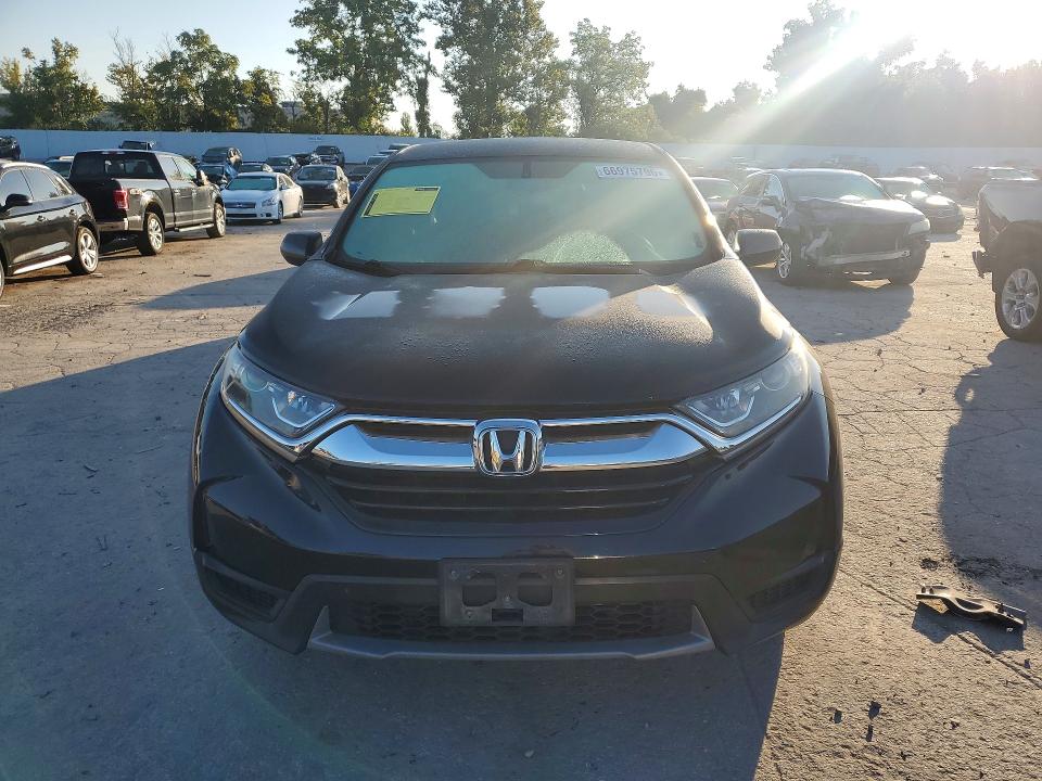 Photo 5 from auction – 2019 HONDA CR-V with VIN 2HKRW6H36KH209532