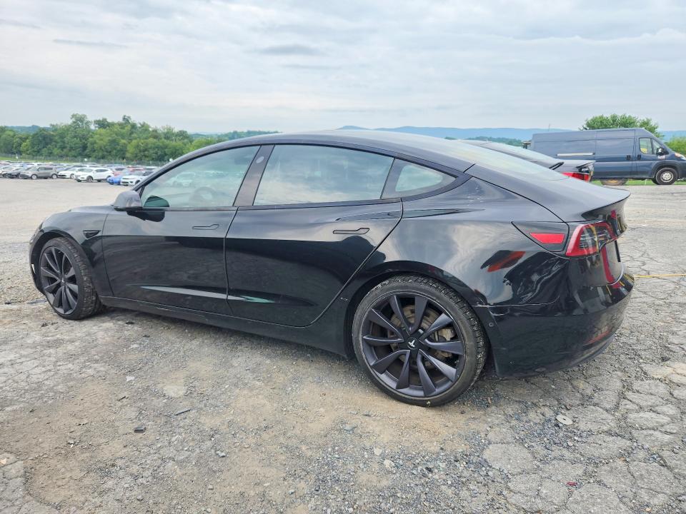 Photo 2 from auction – 2021 TESLA MODEL 3 with VIN 5YJ3E1EAXMF915144