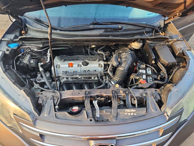 Photo 11 from auction – 2013 HONDA CR-V with VIN 5J6RM4H55DL039247