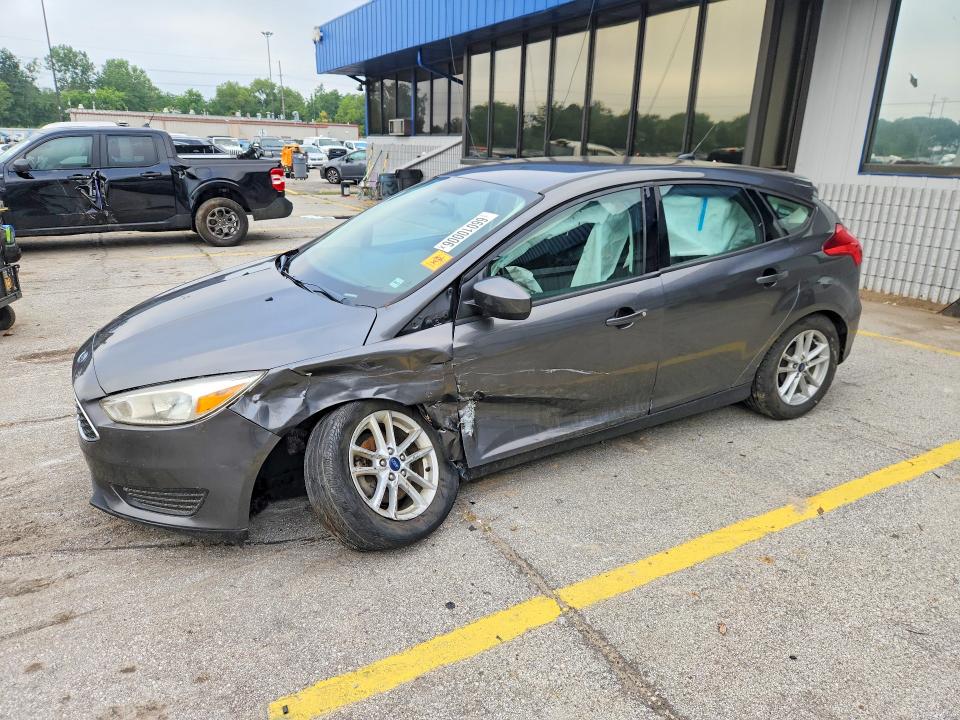 FORD FOCUS 2018 with VIN 1FADP3K28JL297604 - Photo from auction
