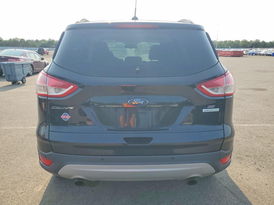 Photo 6 from auction – 2016 FORD ESCAPE with VIN 1FMCU0GX8GUA63981