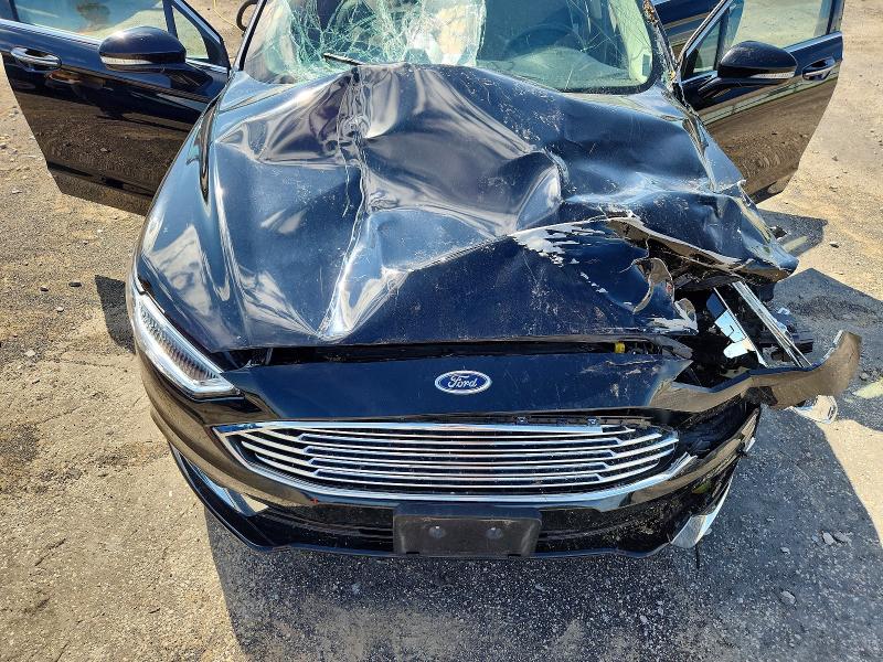 Photo 11 from auction – 2018 FORD FUSION with VIN 3FA6P0D99JR247653