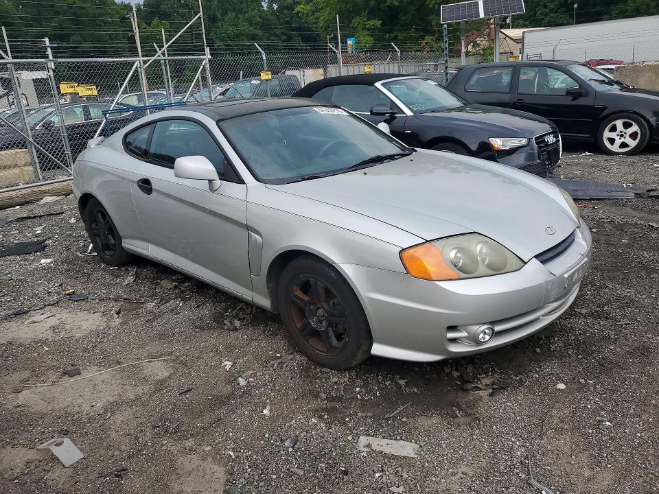 Photo 4 from auction – 2003 HYUNDAI TIBURON with VIN KMHHN65F33U013208