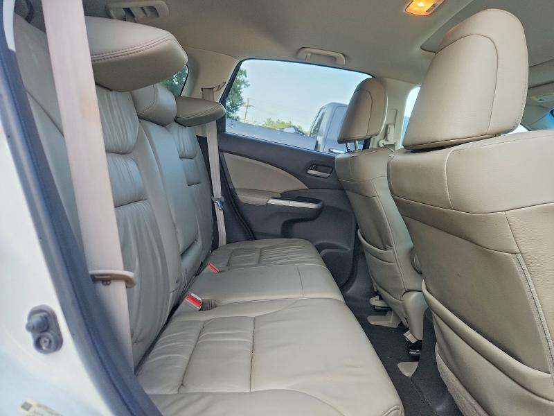 Photo 11 from auction – 2014 HONDA CR-V with VIN 5J6RM4H70EL000987