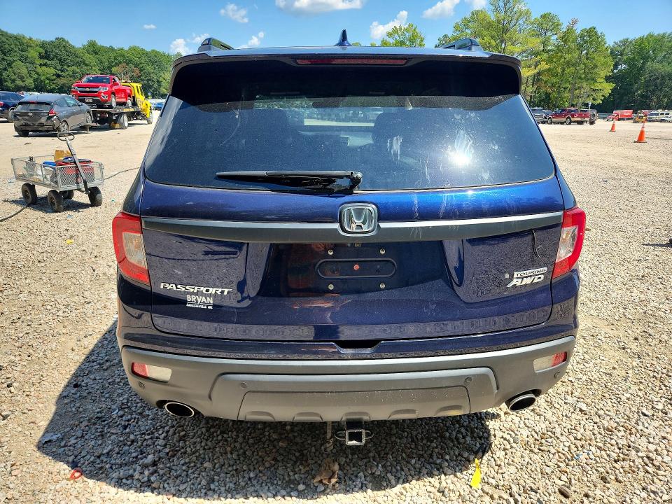 Photo 6 from auction – 2021 HONDA PASSPORT with VIN 5FNYF8H92MB036038