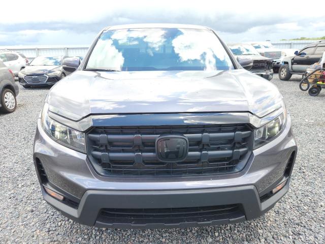 Photo 5 from auction – 2024 HONDA RIDGELINE with VIN 5FPYK3F50RB012771