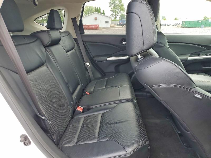 Photo 11 from auction – 2016 HONDA CR-V with VIN 5J6RM4H70GL067592
