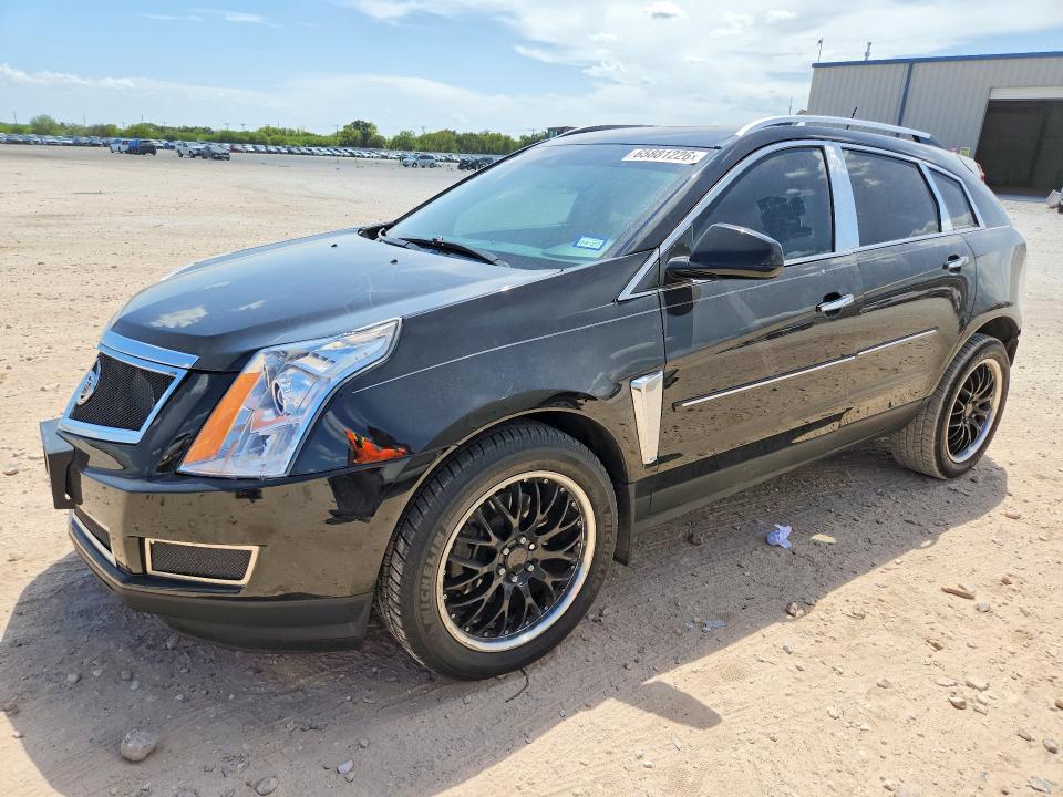 CADILLAC SRX 2015 with VIN 3GYFNBE31FS582065 - Photo from auction