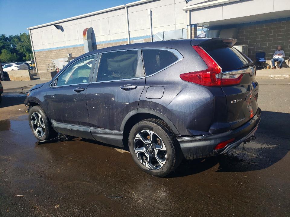 Photo 2 from auction – 2018 HONDA CR-V with VIN 7FARW2H90JE099155