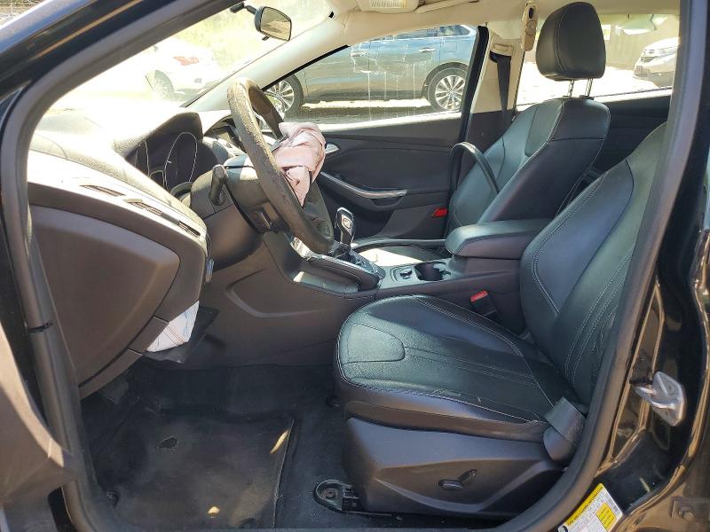 Photo 7 from auction – 2014 FORD FOCUS with VIN 1FADP3J20EL159983