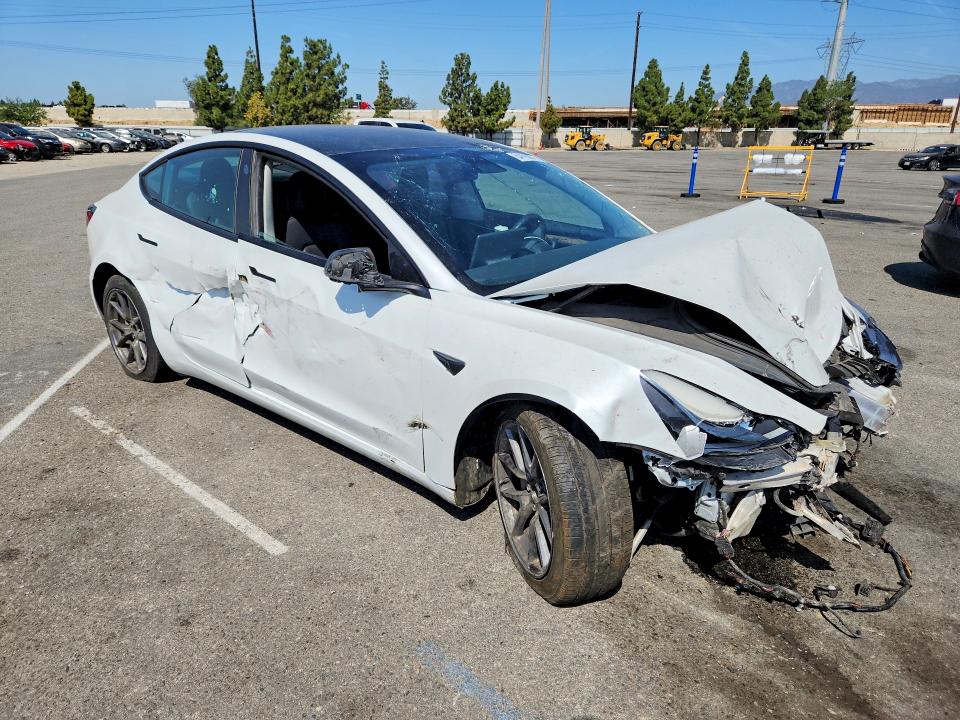 Photo 4 from auction – 2022 TESLA MODEL 3 with VIN 5YJ3E1EB8NF274702