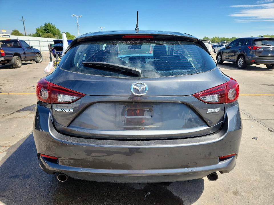 Photo 6 from auction – 2017 MAZDA 3 with VIN JM1BN1L32H1124024
