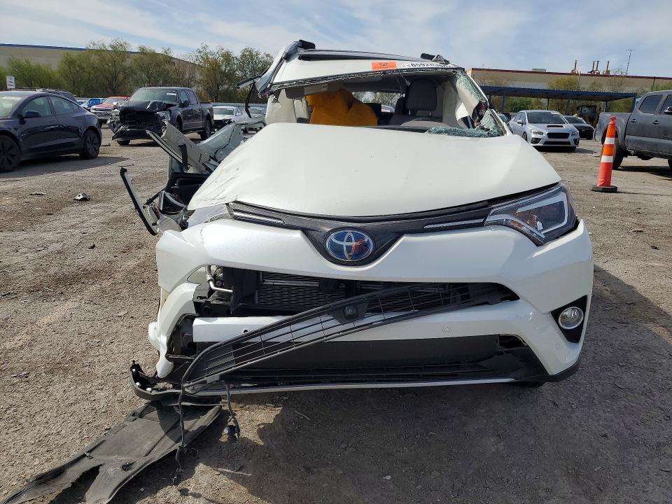 Photo 5 from auction – 2018 TOYOTA RAV4 HV with VIN JTMDJREV7JD186637