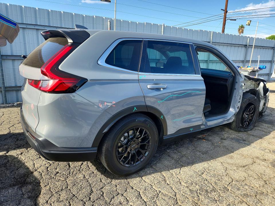 Photo 3 from auction – 2023 HONDA CR-V with VIN 2HKRS3H25PH307623